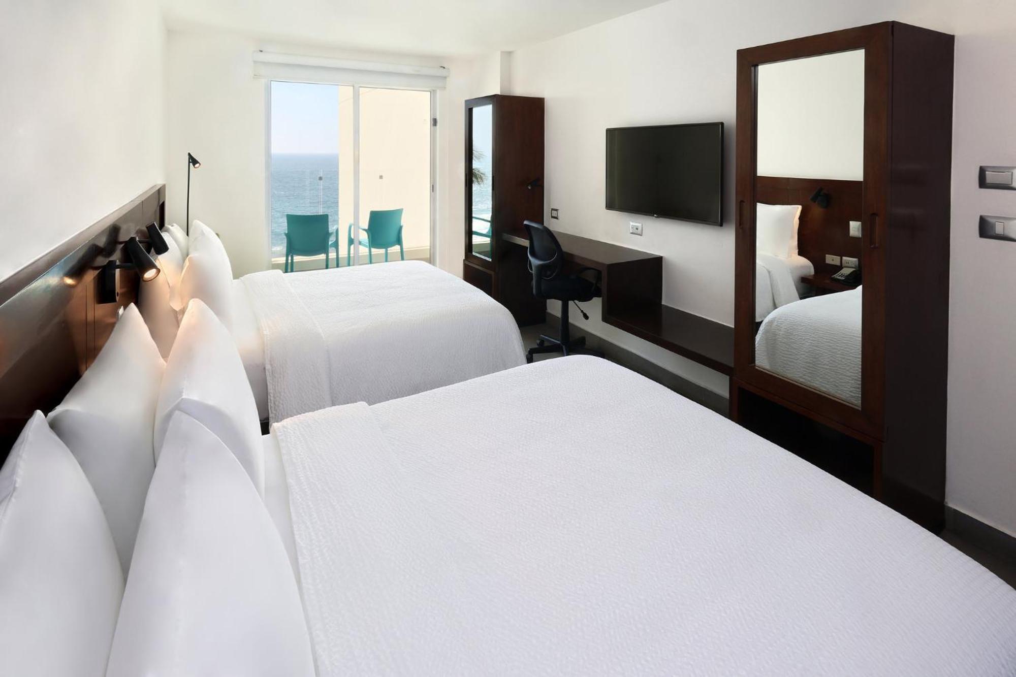 Standard Queen Room Two Queen Beds Ocean View
